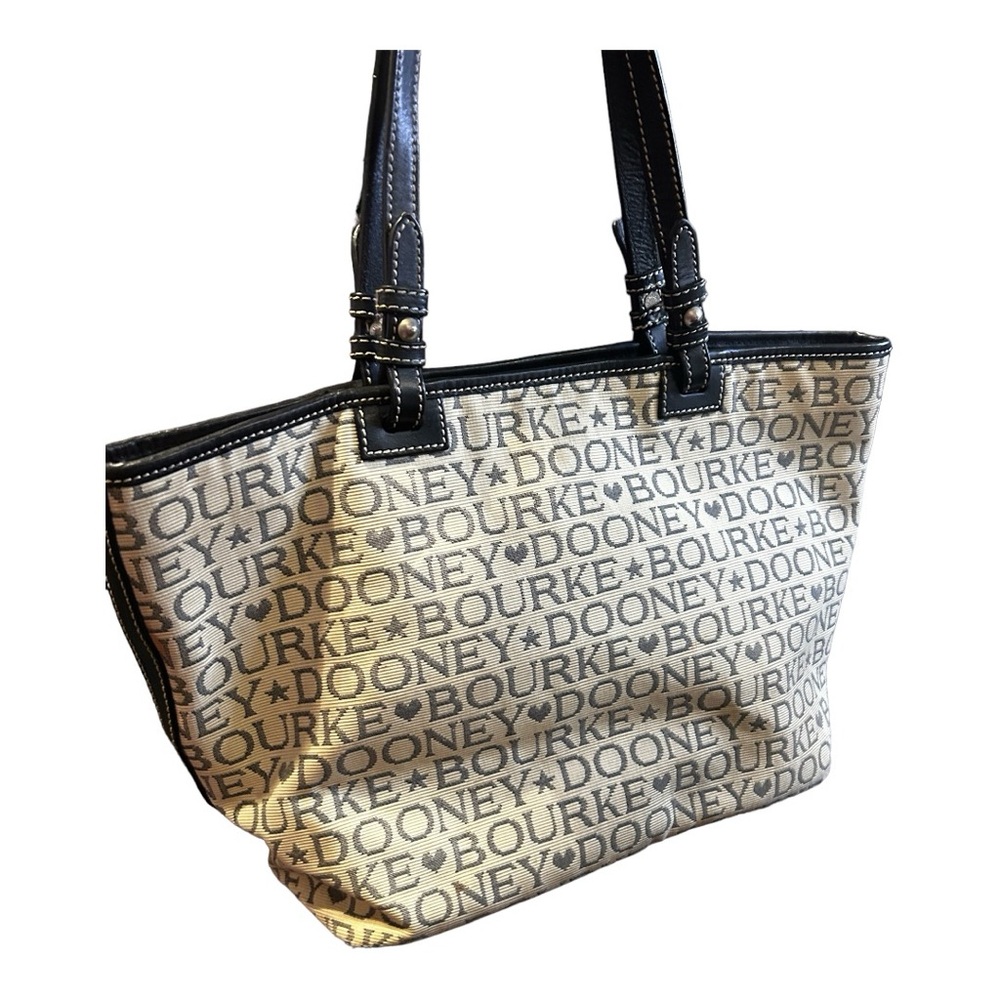 Dooney And Bourne handbag GUC some stain inside to be cleaned handles good shape